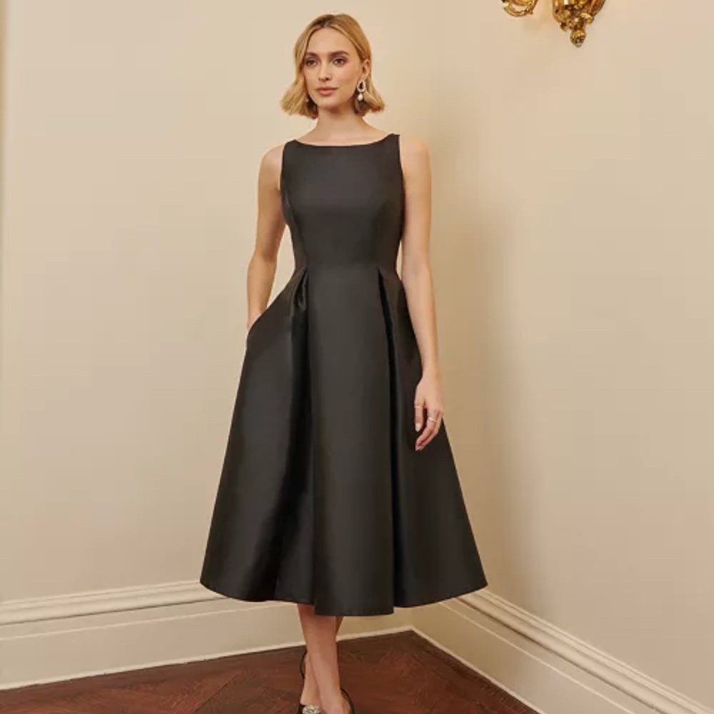 The ultimate versatile black dress. Adrianna Papell